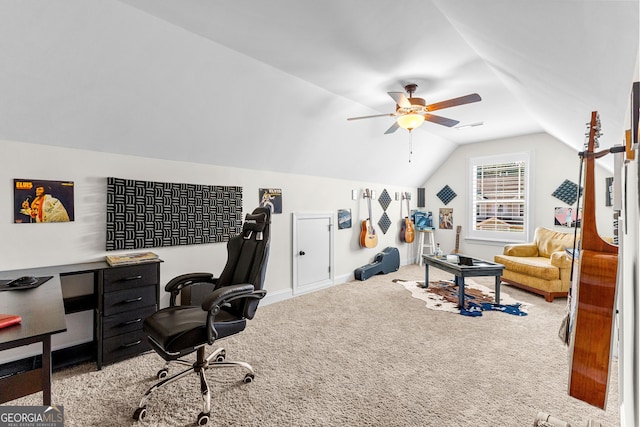 office area featuring carpet, visible vents, ceiling fan, and lofted ceiling