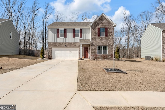 traditional-style home featuring cooling unit, a garage, brick siding, driveway, and board and batten siding