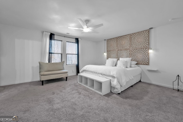 bedroom featuring carpet floors, ceiling fan, visible vents, and baseboards