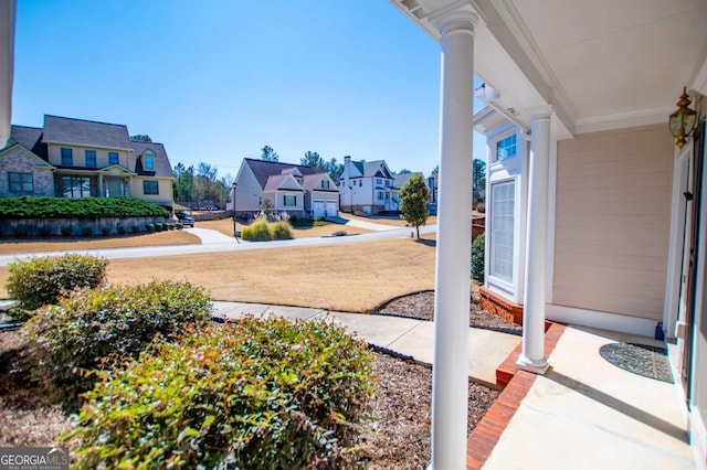 view of yard with a residential view