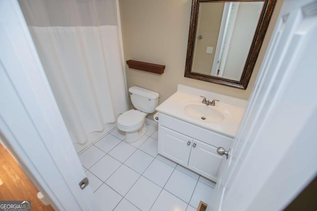 bathroom with visible vents, a shower with shower curtain, toilet, tile patterned flooring, and vanity