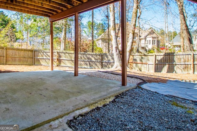 view of yard featuring a patio and a fenced backyard