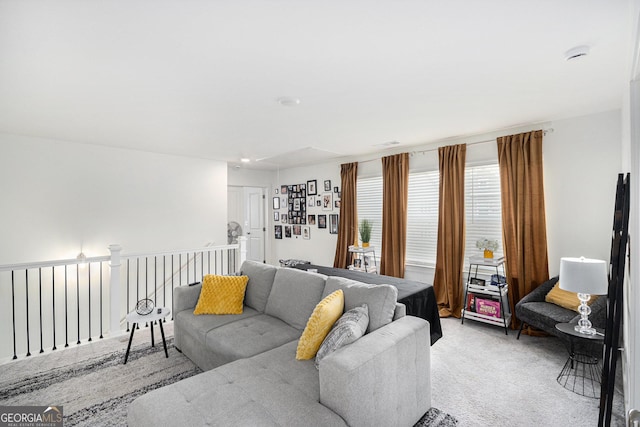 living room with light colored carpet