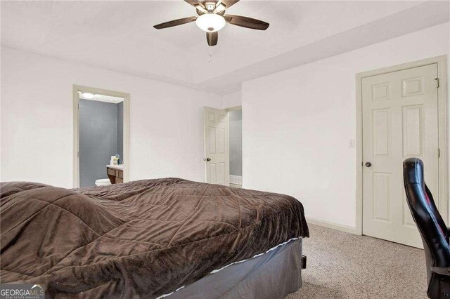 bedroom featuring ceiling fan and light colored carpet