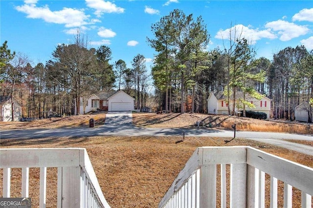 view of yard with a garage