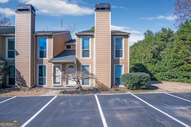 exterior space featuring uncovered parking