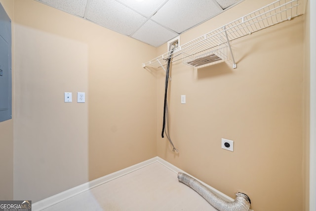 clothes washing area featuring laundry area, baseboards, and hookup for an electric dryer