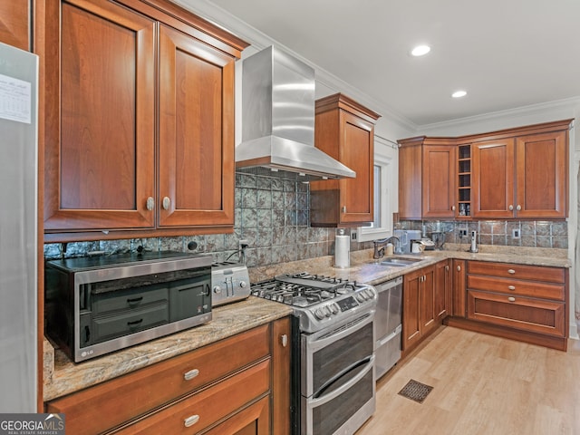 kitchen featuring range hood, appliances with stainless steel finishes, light stone countertops, tasteful backsplash, and crown molding