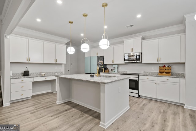 kitchen with visible vents, freestanding refrigerator, electric range oven, stainless steel microwave, and crown molding