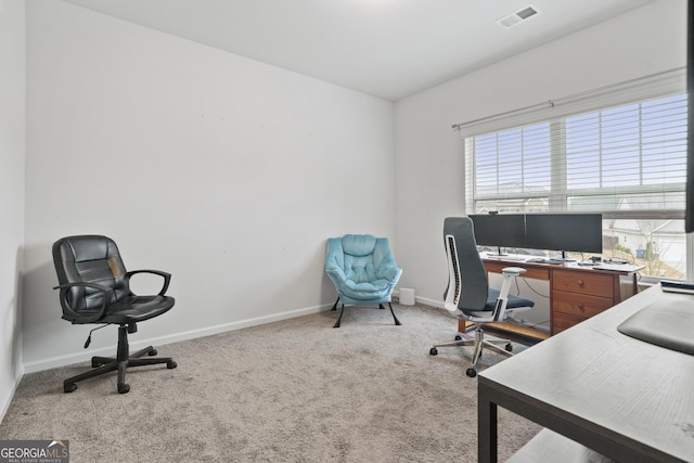 home office featuring carpet flooring, visible vents, and baseboards