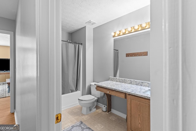 full bath featuring shower / tub combo with curtain, visible vents, toilet, a textured ceiling, and vanity