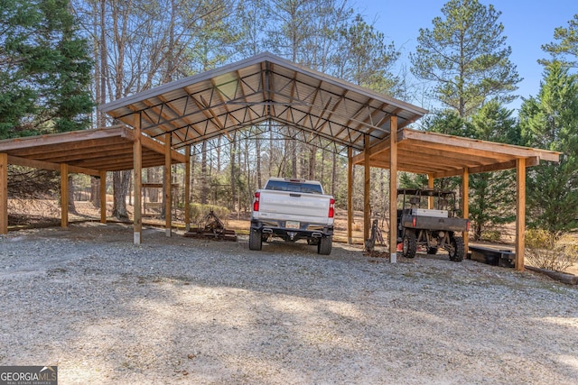 view of parking / parking lot featuring a detached carport