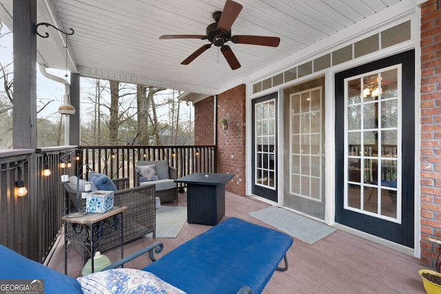 view of patio featuring ceiling fan and outdoor lounge area