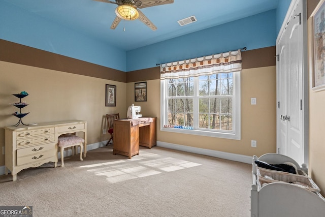 home office featuring ceiling fan, carpet floors, visible vents, and baseboards