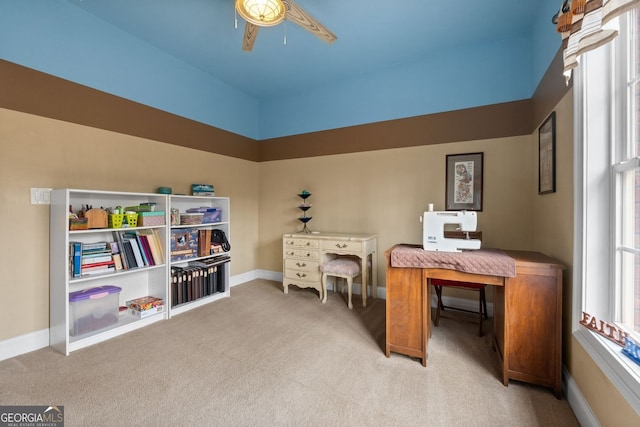 office space featuring carpet flooring and baseboards