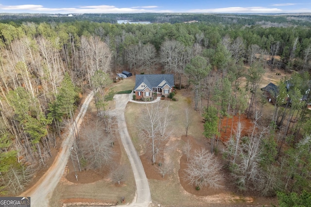 bird's eye view featuring a forest view