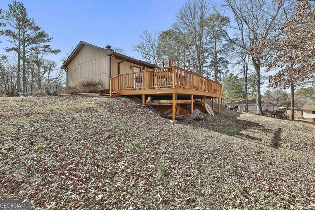 rear view of house with a deck