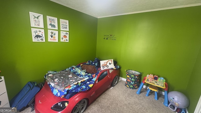 carpeted bedroom featuring crown molding and baseboards