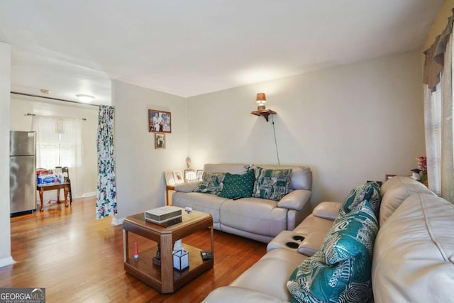 living area with wood finished floors