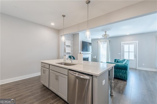 1703 Prospect Way, Conyers, GA 30094 - kitchen with stainless steel dishwasher, open floor plan, dark wood-style floors, an island with sink, and recessed lighting