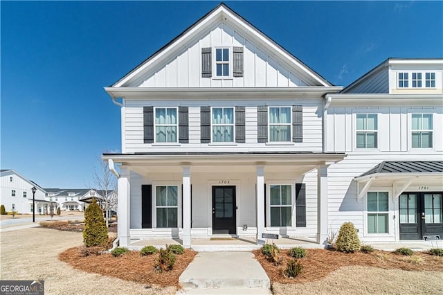1703 Prospect Way, Conyers, GA 30094 - view of front of property with covered porch and board and batten siding