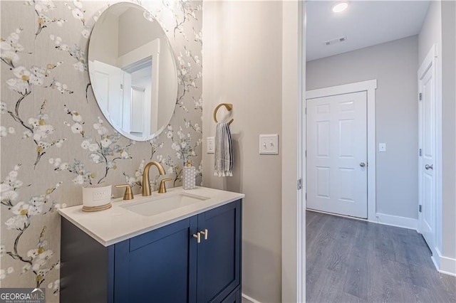 1703 Prospect Way, Conyers, GA 30094 - bathroom featuring wood finished floors and vanity