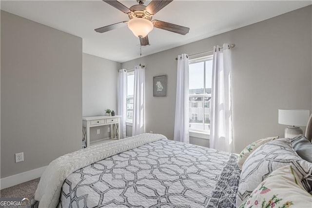 1703 Prospect Way, Conyers, GA 30094 - carpeted bedroom with baseboards and ceiling fan