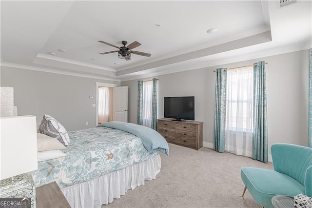 1703 Prospect Way, Conyers, GA 30094 - bedroom featuring a tray ceiling, multiple windows, carpet flooring, a ceiling fan, and ornamental molding