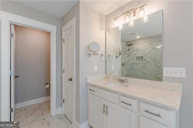 1703 Prospect Way, Conyers, GA 30094 - bathroom featuring a marble finish shower, vanity, and marble look tiles