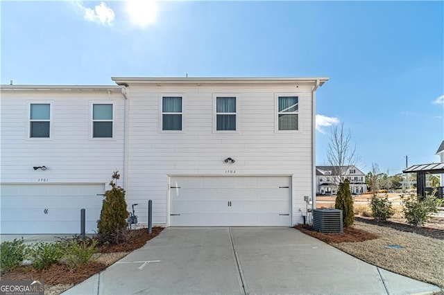 1703 Prospect Way, Conyers, GA 30094 - view of front of property with a garage and concrete driveway