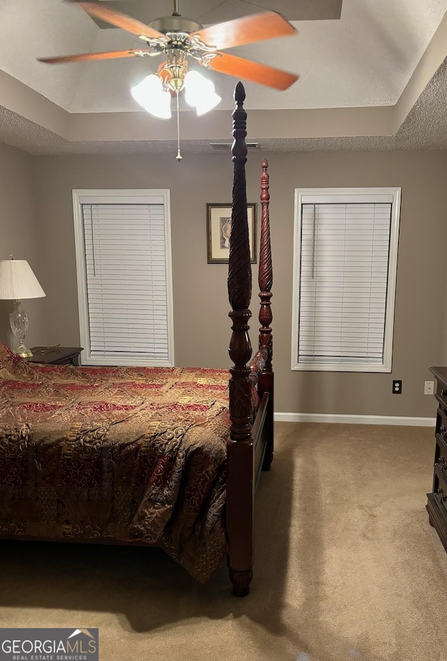 bedroom featuring carpet floors, ceiling fan, and baseboards