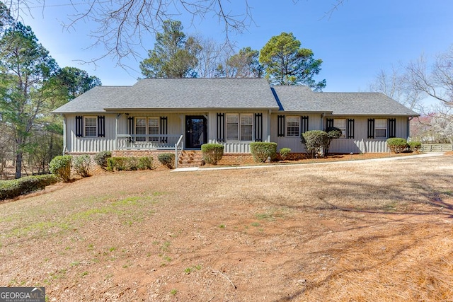 ranch-style house with covered porch