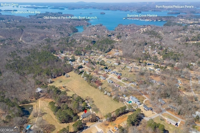 aerial overview of property's location featuring a nearby body of water