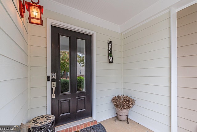 entrance to property with covered porch