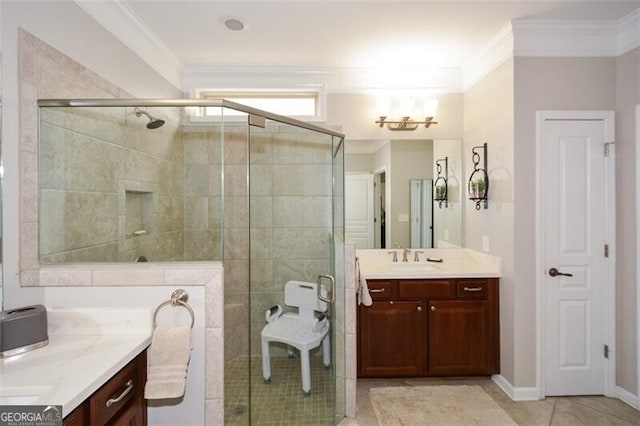 full bathroom with ornamental molding, a stall shower, and vanity