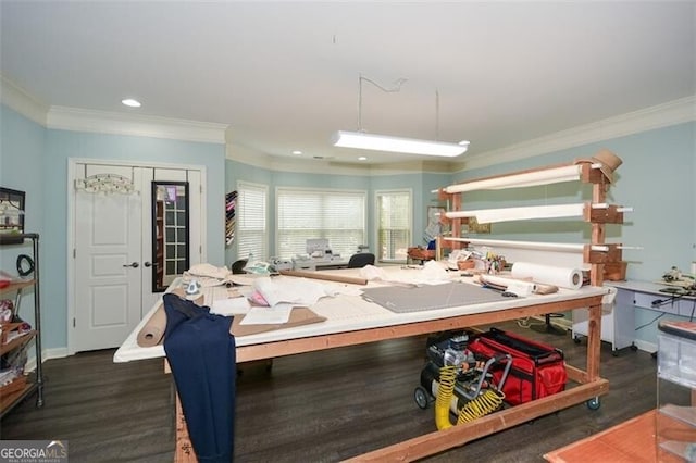 kitchen featuring baseboards, ornamental molding, wood finished floors, and recessed lighting