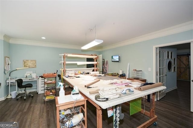 dining room featuring crown molding and wood finished floors