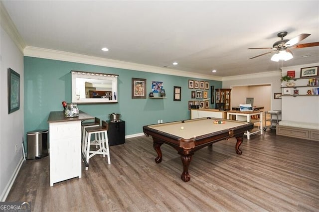 recreation room featuring recessed lighting, crown molding, baseboards, and wood finished floors