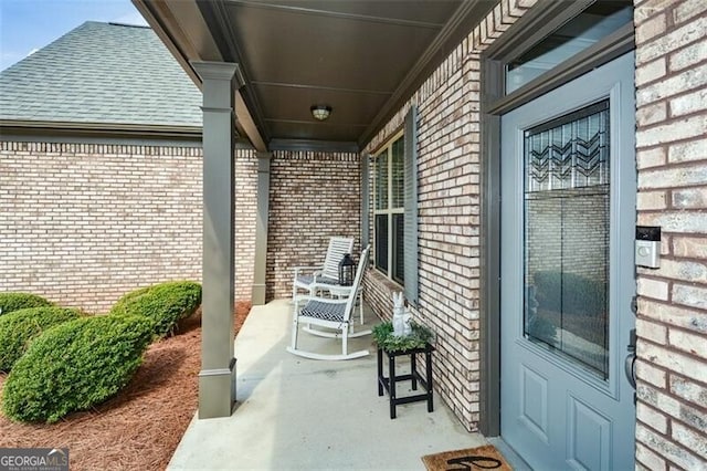 view of patio featuring a porch