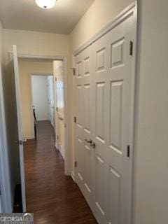 hall with dark wood finished floors