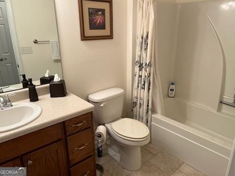 bathroom with toilet, tile patterned flooring, shower / tub combo with curtain, and vanity