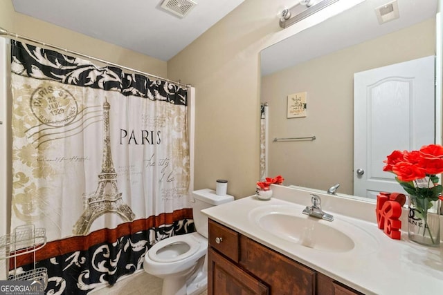 bathroom with toilet, curtained shower, visible vents, and vanity