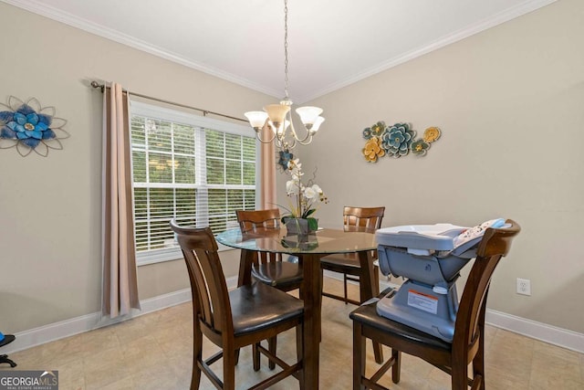 dining area with baseboards, a notable chandelier, and crown molding