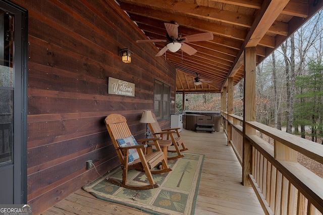 wooden terrace with ceiling fan