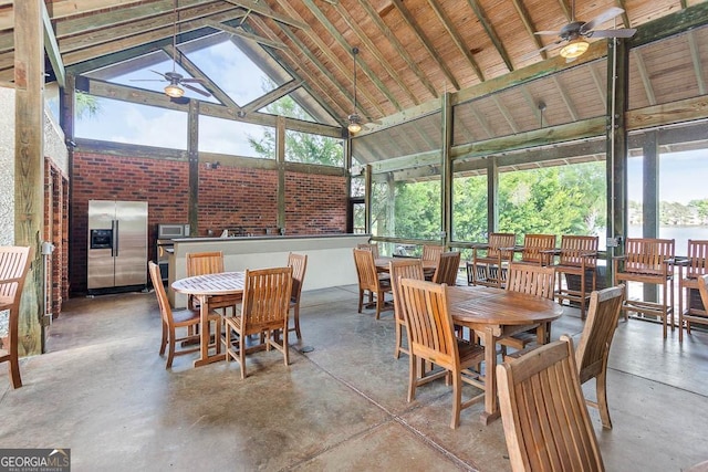 interior space with vaulted ceiling and ceiling fan