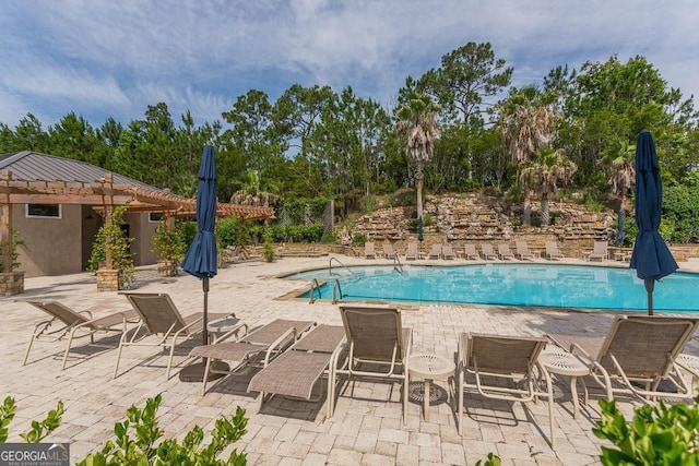 pool featuring a patio area