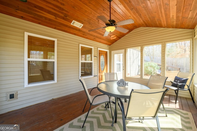 sunroom / solarium featuring wooden ceiling, visible vents, vaulted ceiling, and ceiling fan