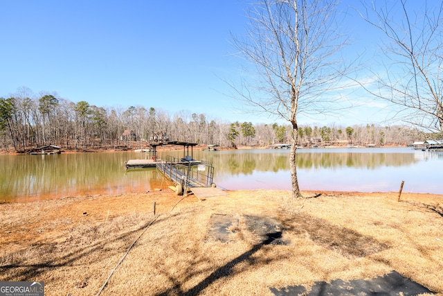 view of dock with a water view