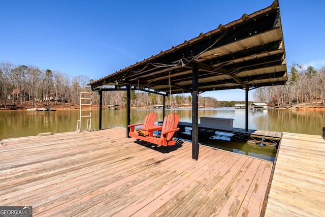 dock area with a water view