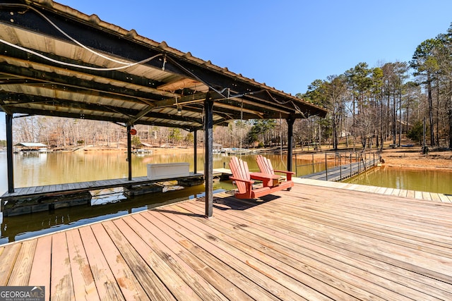 view of dock with a water view